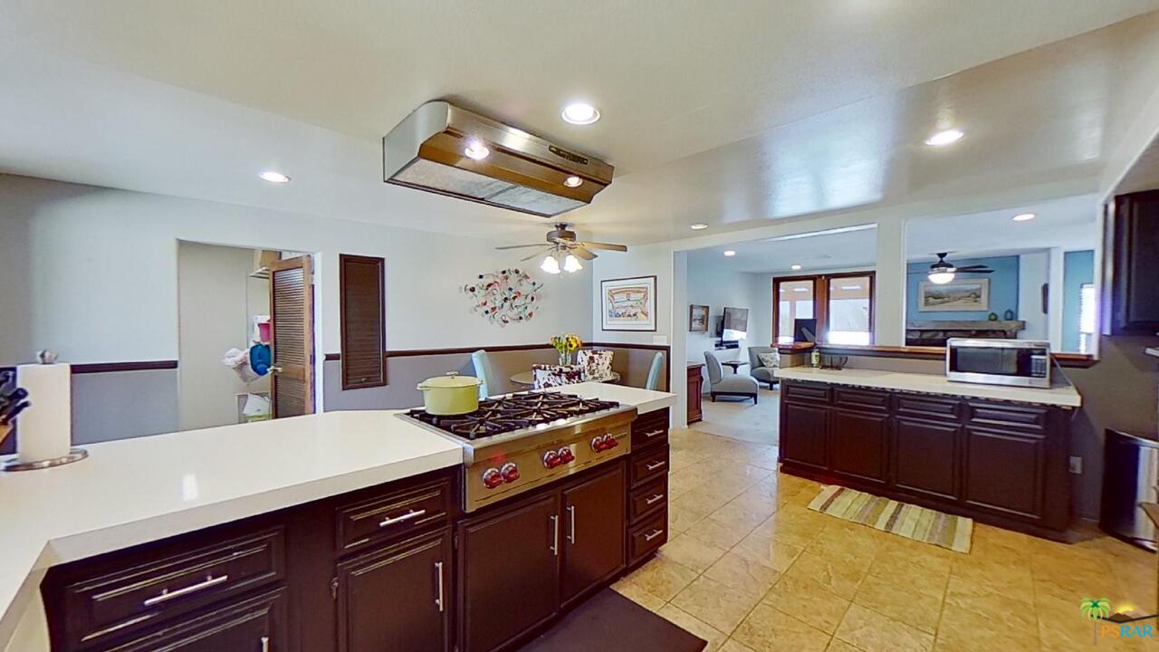 61612 Sagebrush Road North Palm Springs, CA 92258 - Photo 7 of 30 a kitchen with granite countertop lots of counter top space