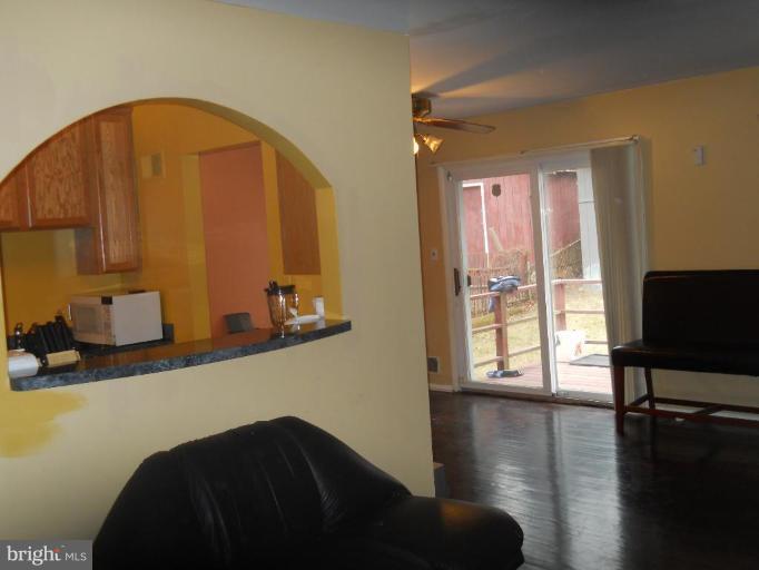 4412 Havelock Road Lanham, MD 20706 - Photo 6 of 11 a living room with furniture and a window