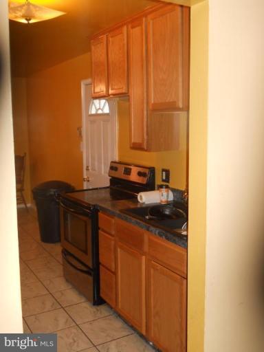 4412 Havelock Road Lanham, MD 20706 - Photo 9 of 11 a kitchen with a sink and a window