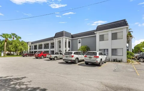 a cars parked in front of a building