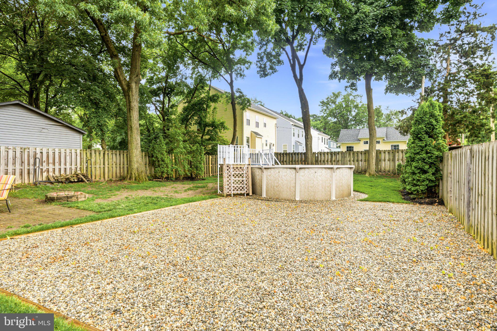 706 Main Street Riverton, NJ 08077 - Photo 41 of 44 Serene backyard oasis with trees.