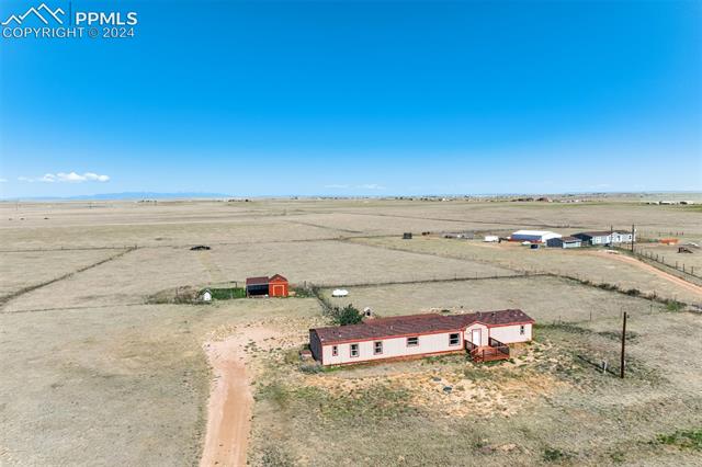 6240 Night Train Lane Yoder, CO 80864 - Photo 6 of 50 Birds eye view of property featuring a rural view