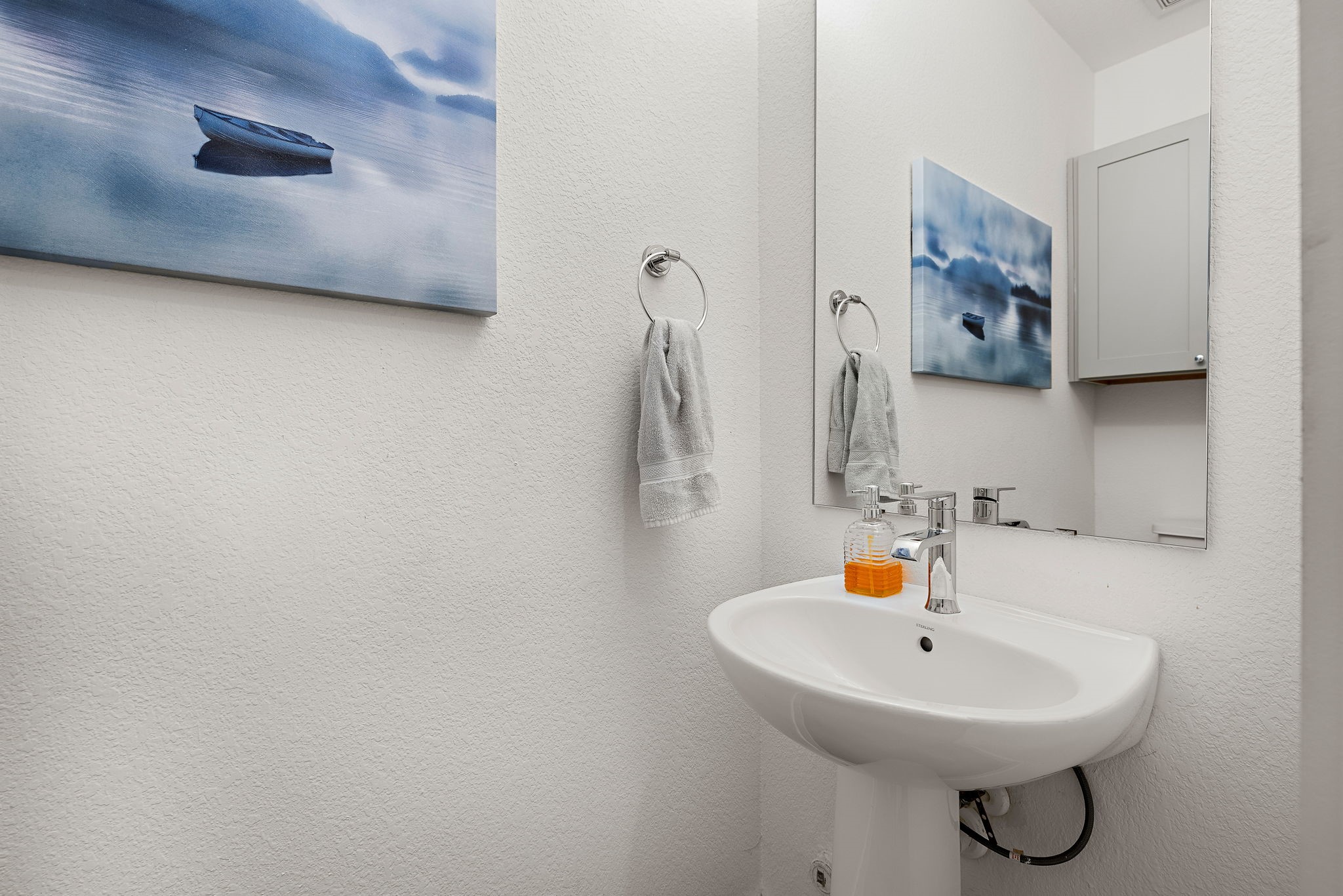 6404 Porter Street, Unit 1 Austin, TX 78741 - Photo 7 of 22 Half bathroom downstairs