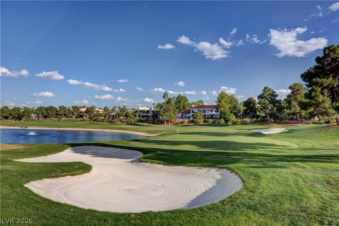 7995 Rio Rico Drive Las Vegas, NV 89113 - Photo 82 of 92 A picturesque golf course setting with a serene water feature and lush green fairways.