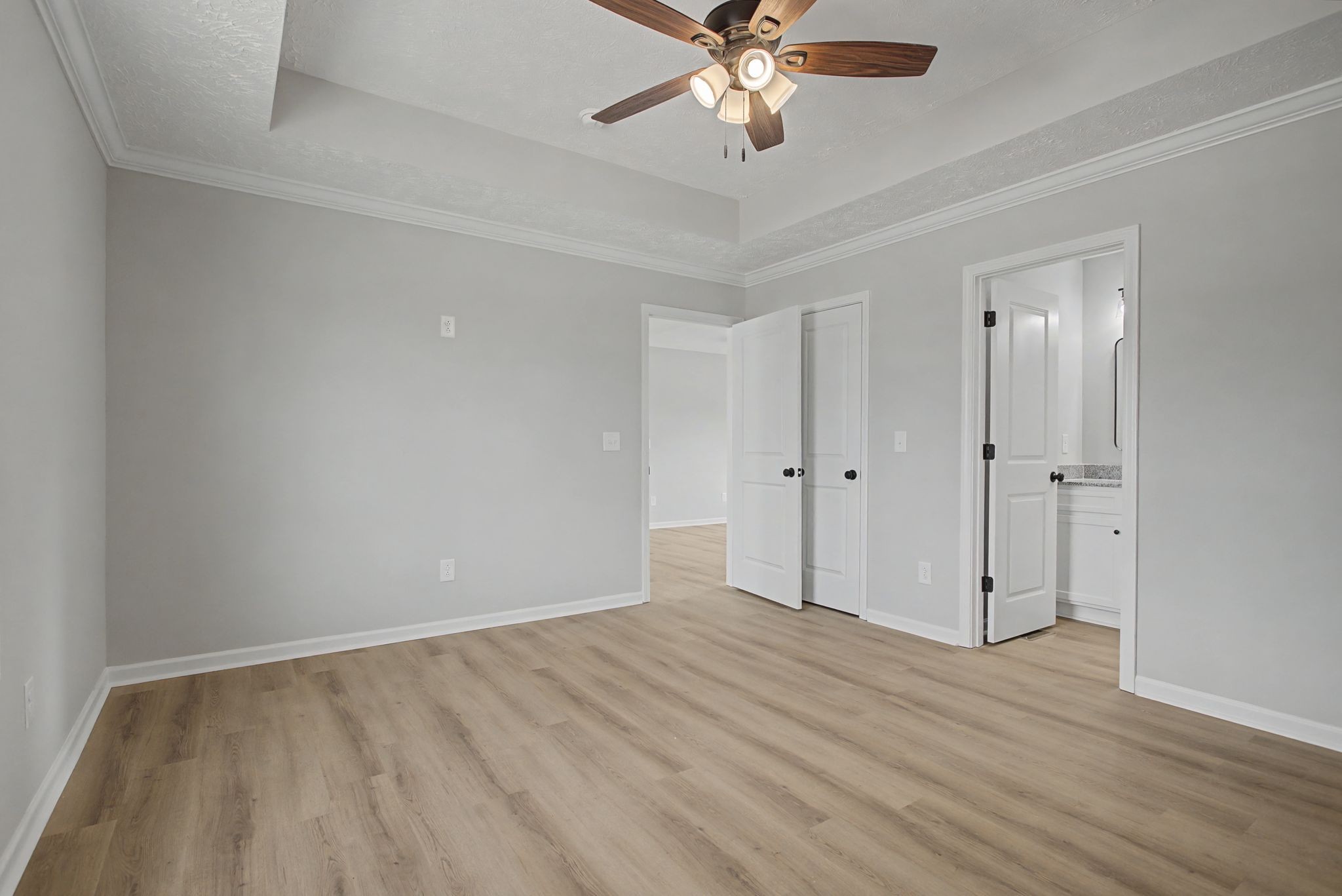 2333 Claude Fox Road Cornersville, TN 37047 - Photo 15 of 24 a view of an empty room with wooden floor