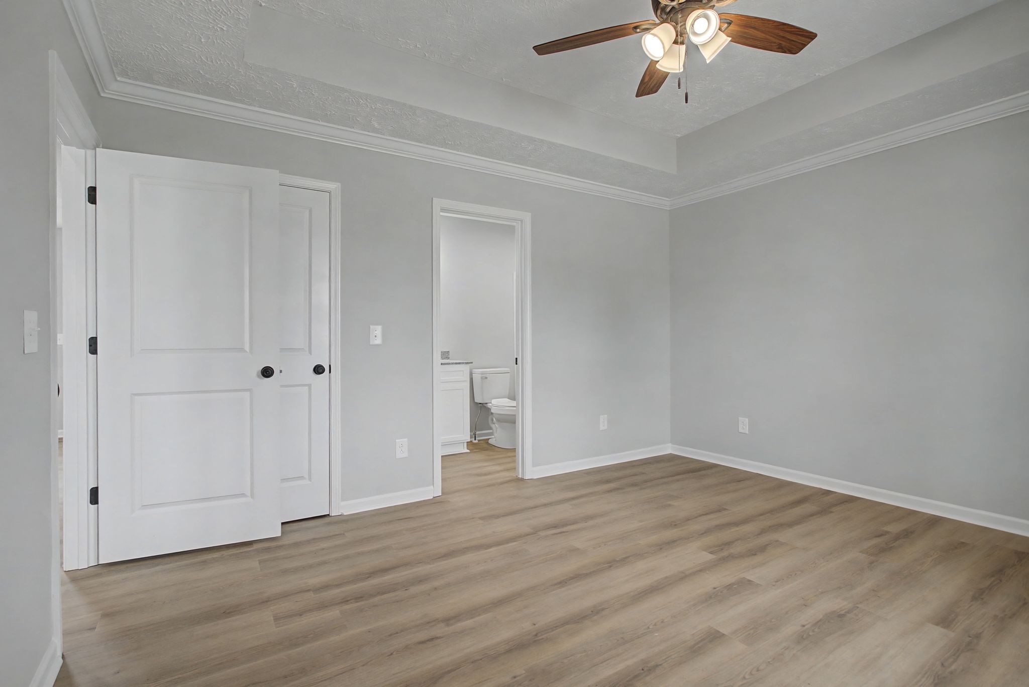 2333 Claude Fox Road Cornersville, TN 37047 - Photo 16 of 24 a view of an empty room with wooden floor