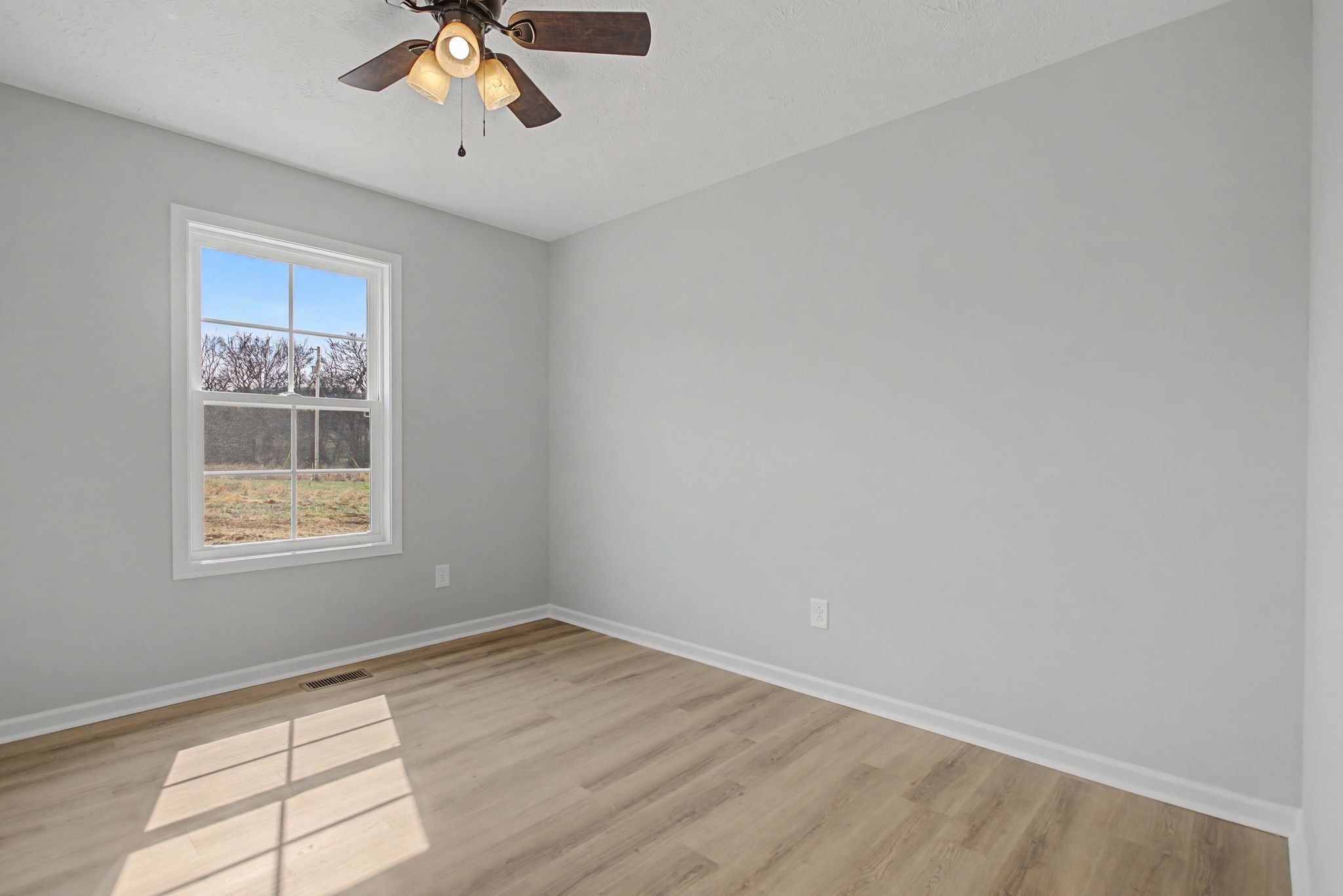 2333 Claude Fox Road Cornersville, TN 37047 - Photo 19 of 24 an empty room with a window
