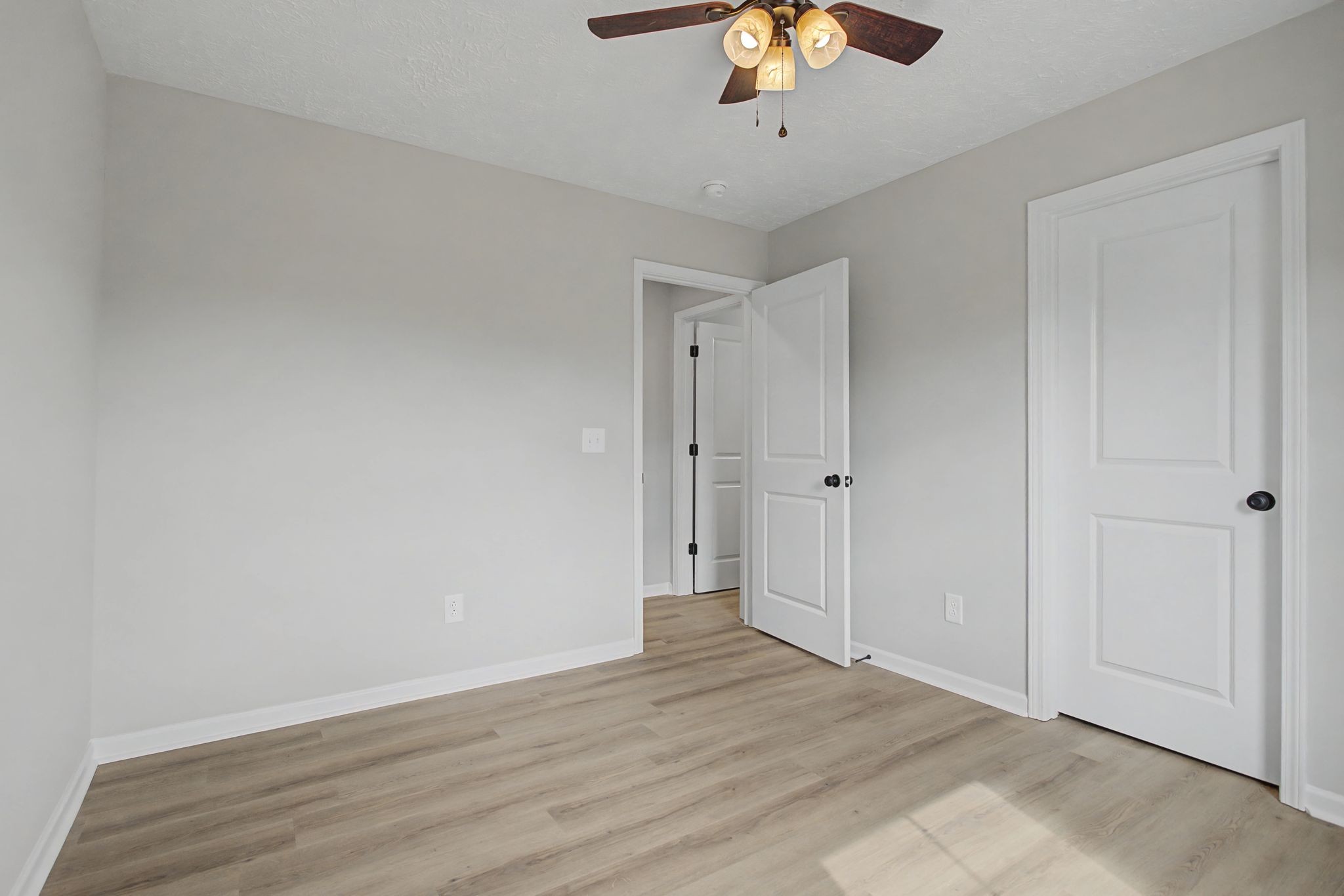 2333 Claude Fox Road Cornersville, TN 37047 - Photo 20 of 24 wooden floor in an empty room