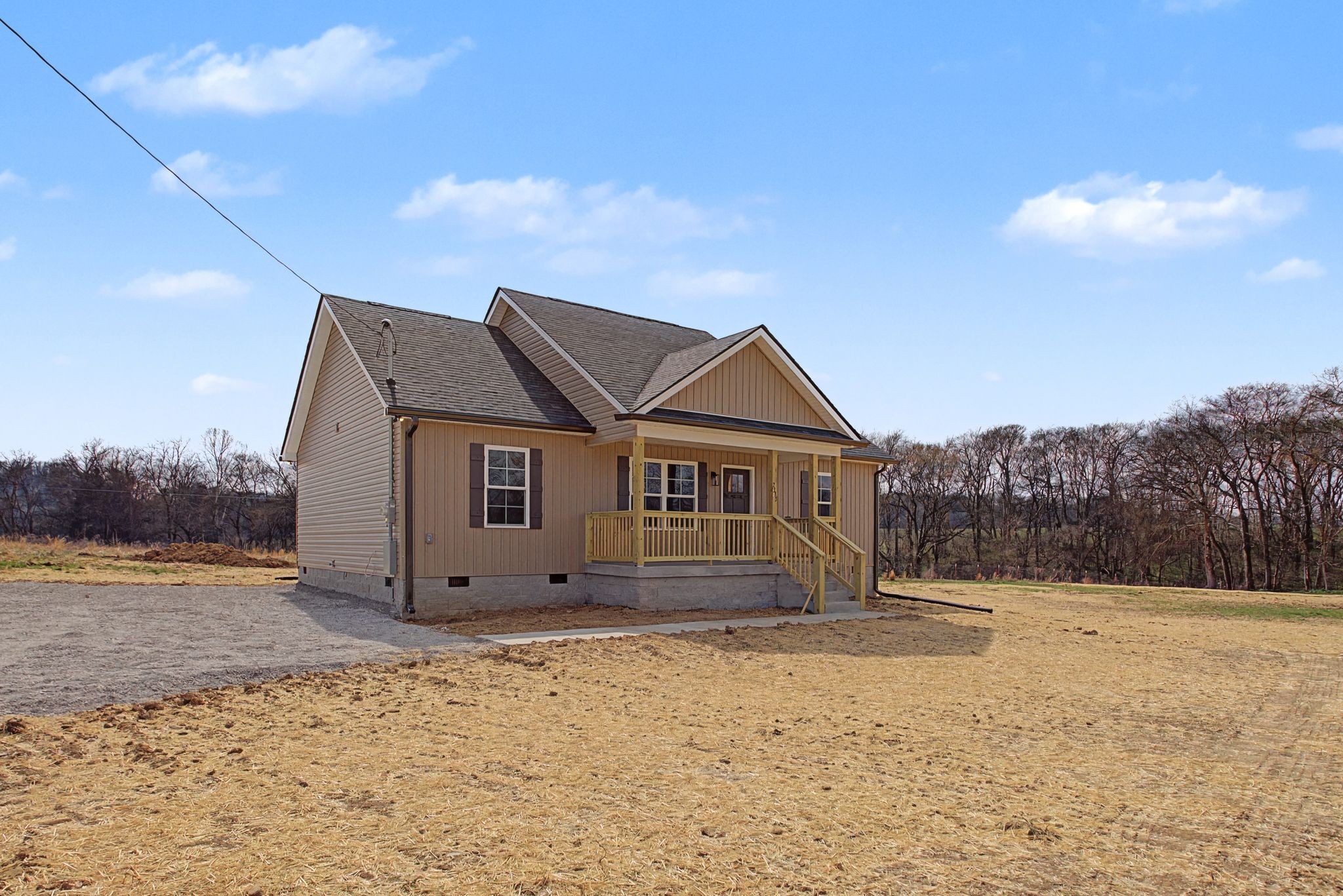 2333 Claude Fox Road Cornersville, TN 37047 - Photo 2 of 24 a view of large house with a yard
