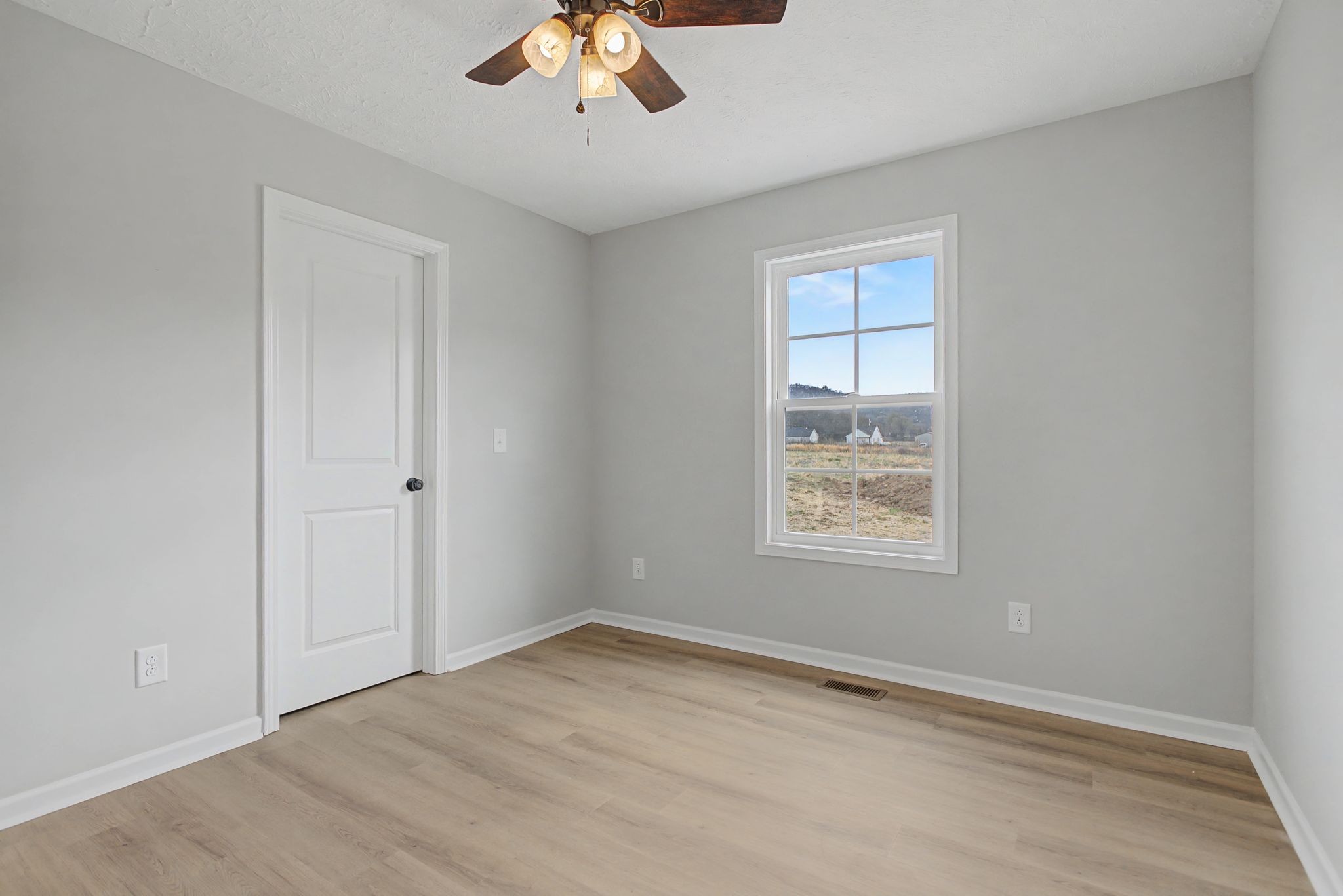 2333 Claude Fox Road Cornersville, TN 37047 - Photo 21 of 24 a view of an empty room with a window