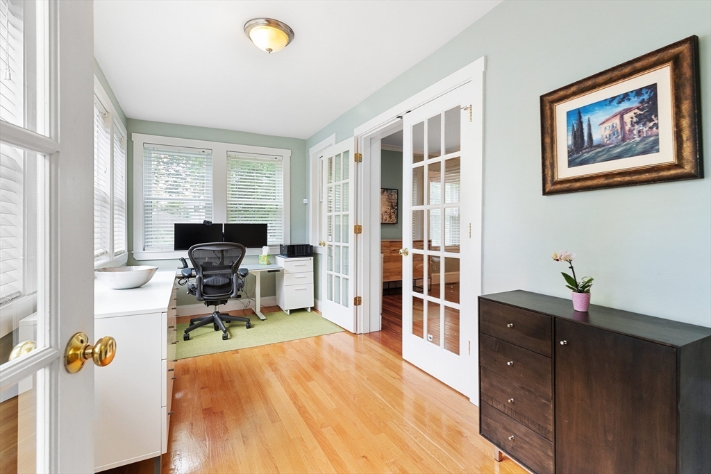 16 Orvis Road, Unit 1 Arlington, MA 02474 - Photo 15 of 31 a view of a livingroom with workspace and a window
