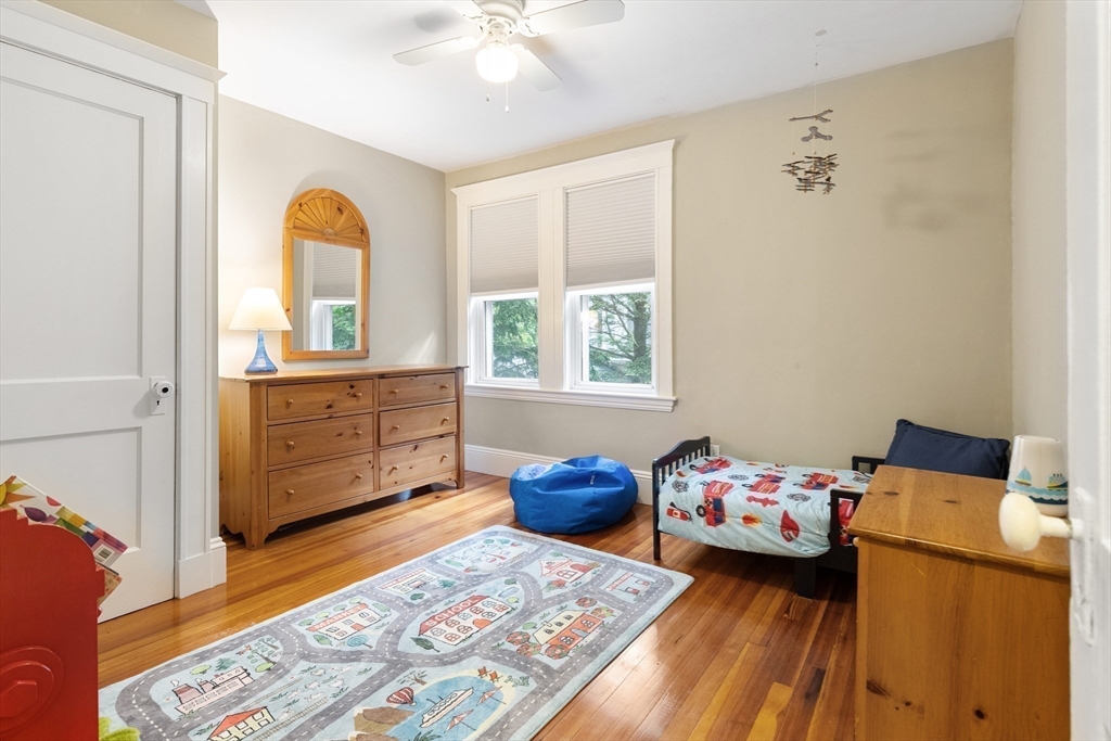 16 Orvis Road, Unit 1 Arlington, MA 02474 - Photo 20 of 31 a bedroom with furniture and a window