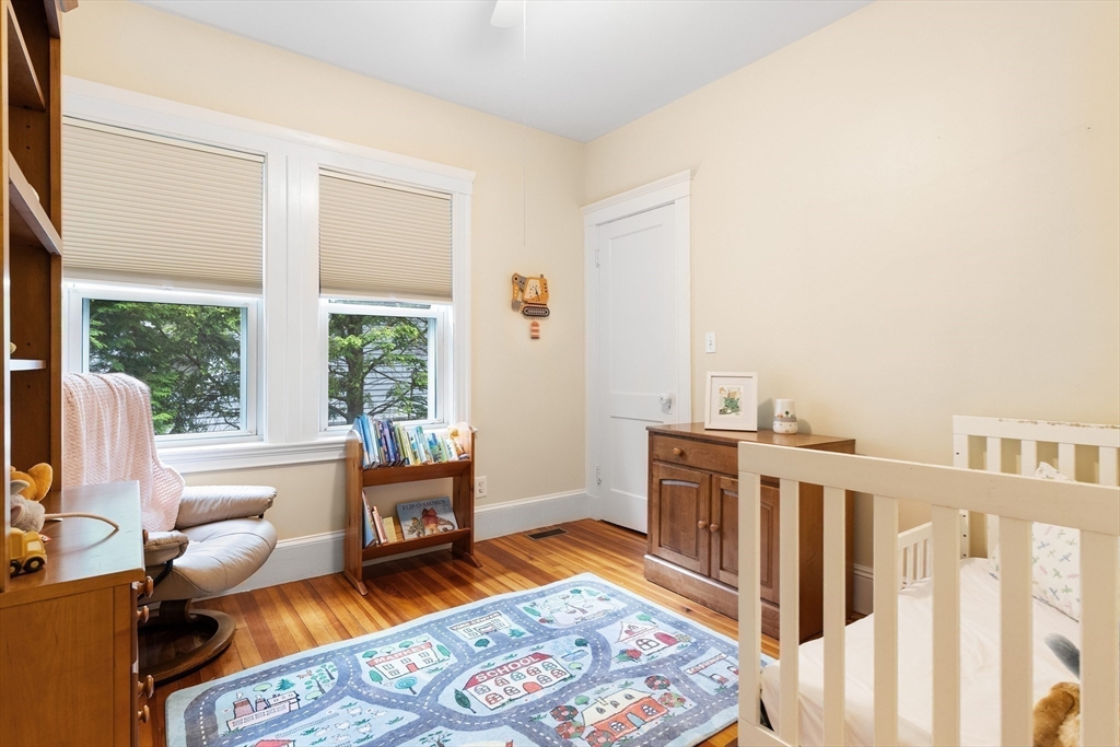 16 Orvis Road, Unit 1 Arlington, MA 02474 - Photo 22 of 31 a living room with furniture and a open kitchen view