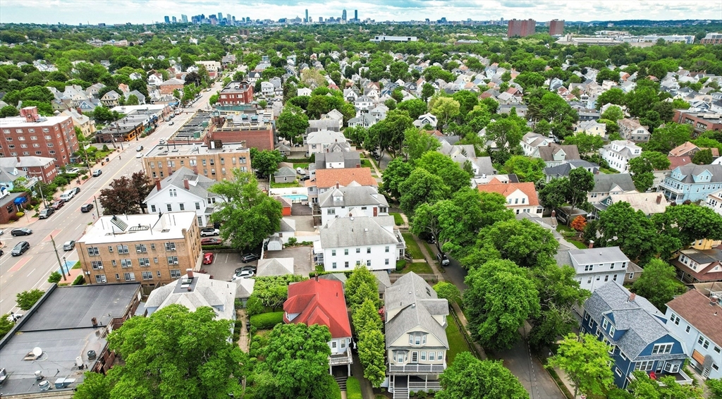 16 Orvis Road, Unit 1 Arlington, MA 02474 - Photo 27 of 31 an aerial view of residential houses with outdoor space