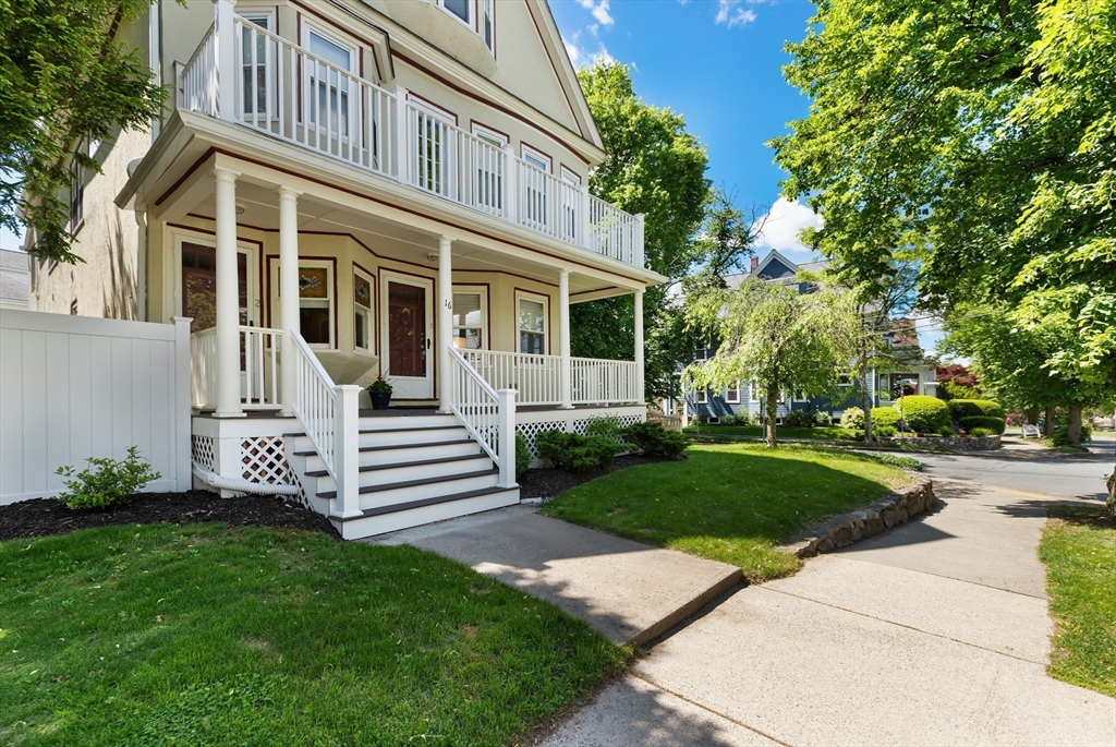 16 Orvis Road, Unit 1 Arlington, MA 02474 - Photo 3 of 31 a front view of a house with a garden