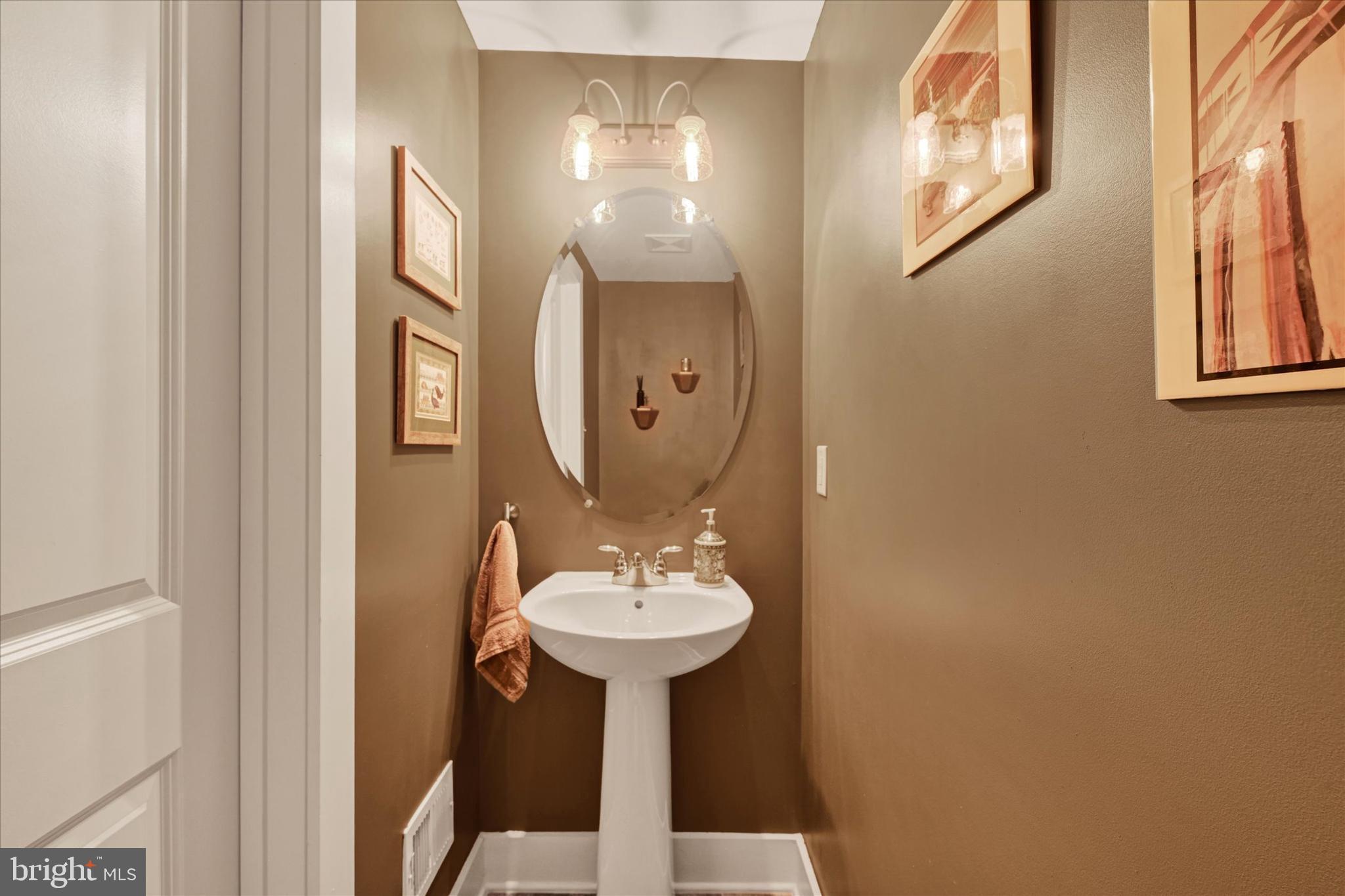 2596 Twin Birch Road Hanover, MD 21076 - Photo 25 of 34 Powder Room adjoins the Family Room