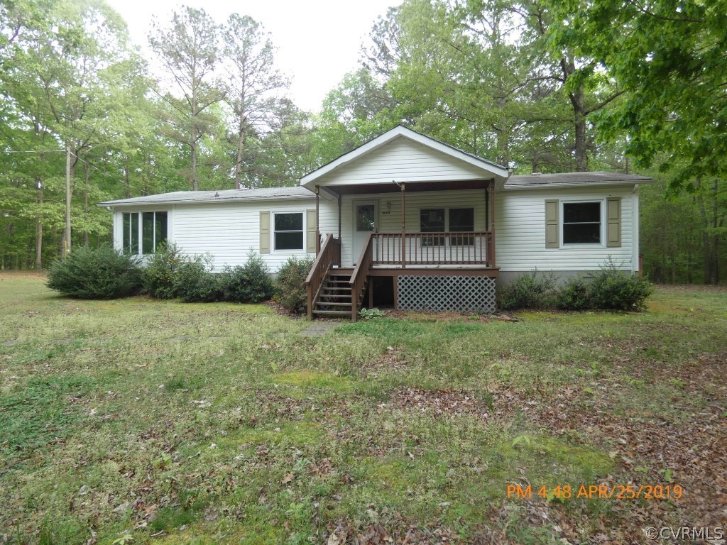 16210 Glebe Road Dewitt, VA 23840 - Photo 1 of 31 a front view of house with yard and trees