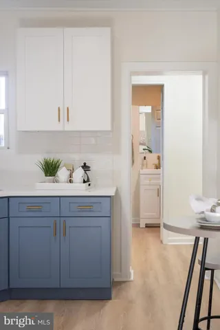 a utility room with cabinets