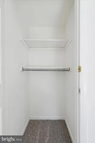 a view of small space with racks on the wall