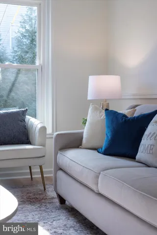 a living room with furniture and a couch