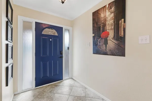 a view of a hallway with entryway