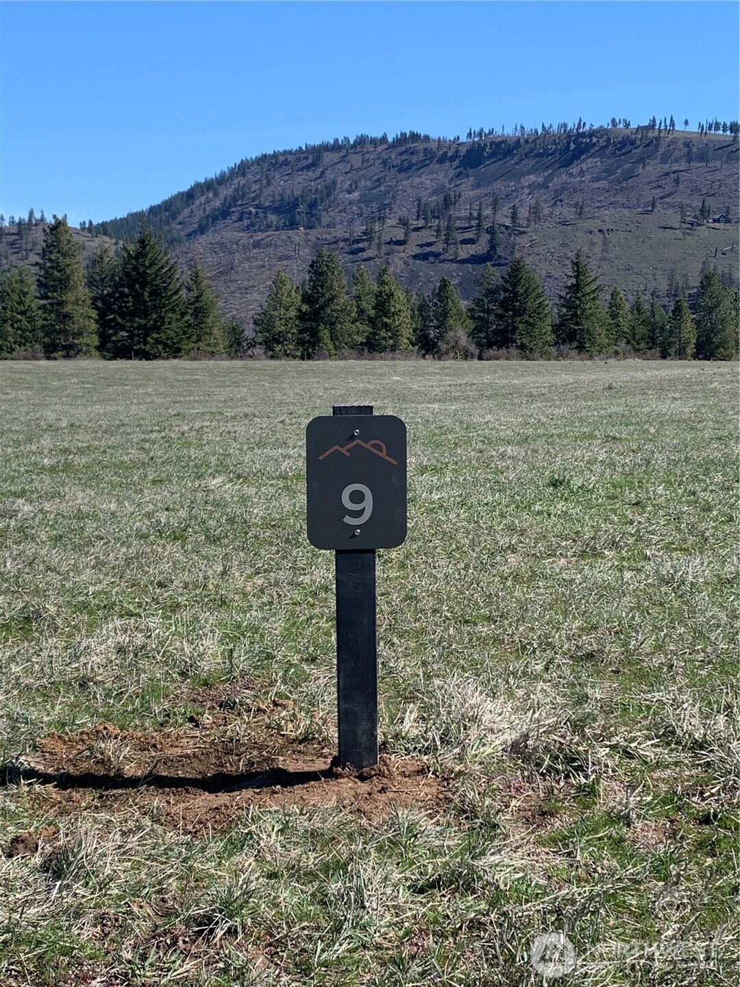 10 Summit View Cle Elum, WA 98922 - Photo 24 of 25 a view of a wooden wall with a lake view