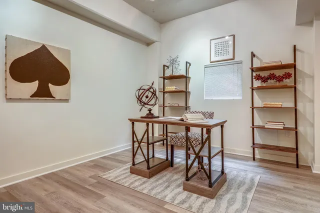a view of a workspace with furniture