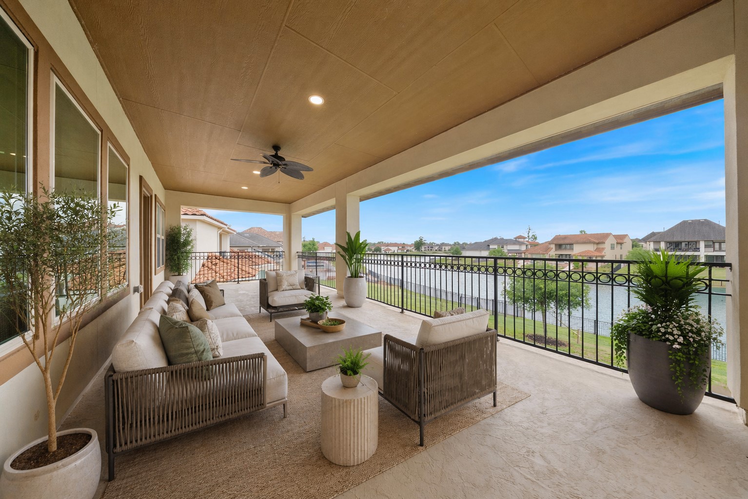 5403 Rouchel Brook Lane Sugar Land, TX 77479 - Photo 25 of 42 Covered balcony perfect for lounge seating and elevated lake views-perfect for morning coffee or evening unwinding.