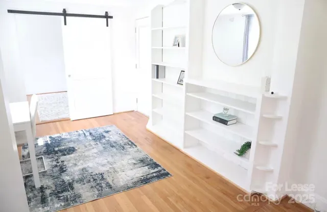 a view of a bathroom sink and a mirror