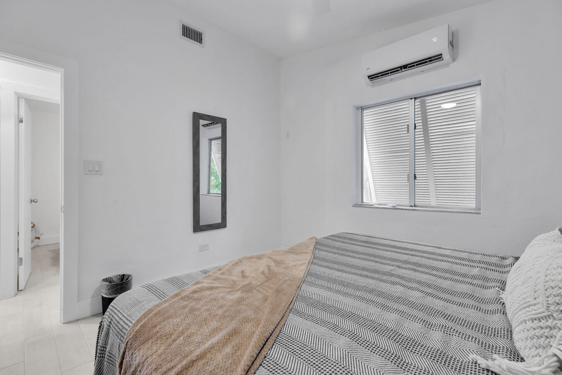 1519 Johnson Street Key West, FL 33040 - Photo 17 of 47 a bedroom with a bed and a window