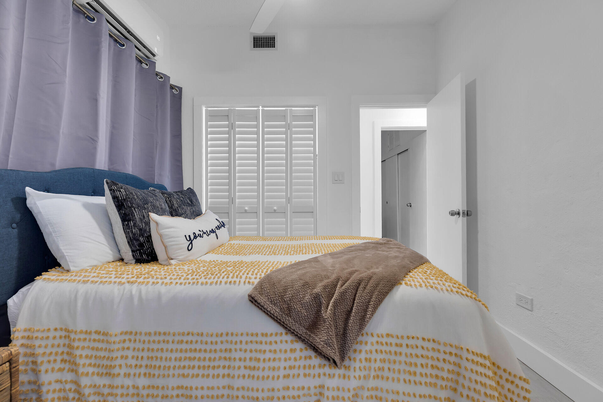 1519 Johnson Street Key West, FL 33040 - Photo 19 of 47 a bedroom with a bed and window