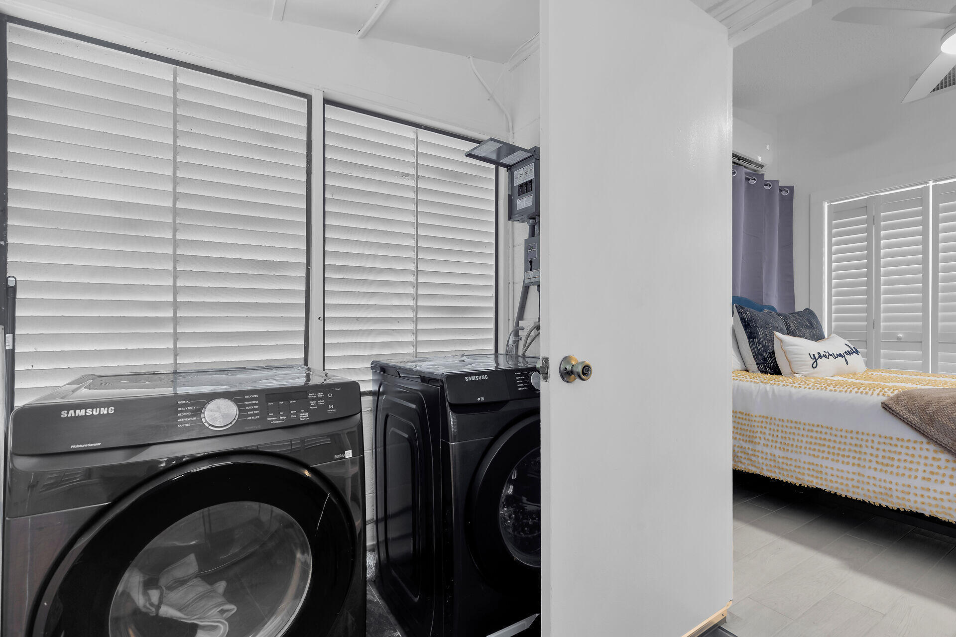 1519 Johnson Street Key West, FL 33040 - Photo 20 of 47 a view of a bedroom with washer and dryer