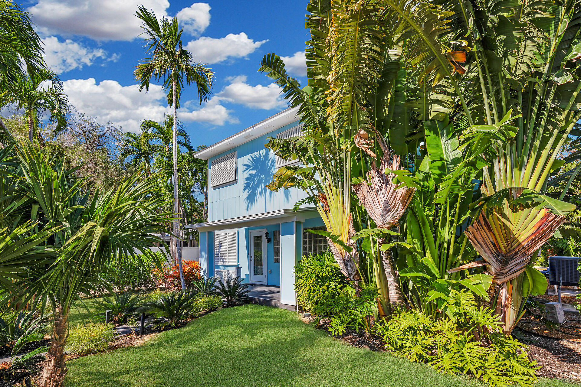 1519 Johnson Street Key West, FL 33040 - Photo 2 of 47 a view of a yard in front of house