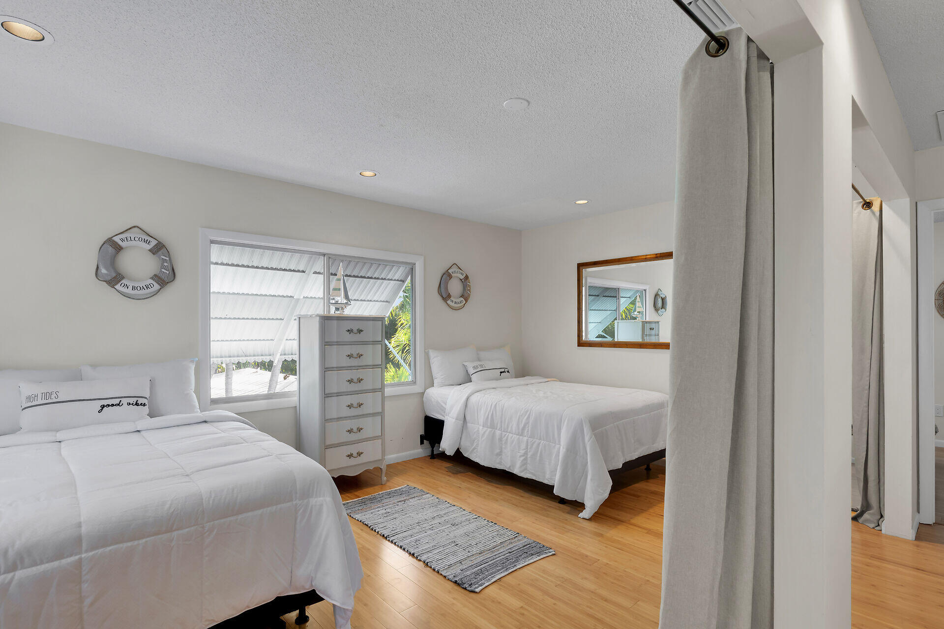 1519 Johnson Street Key West, FL 33040 - Photo 24 of 47 a bedroom with a bed and a closet with window