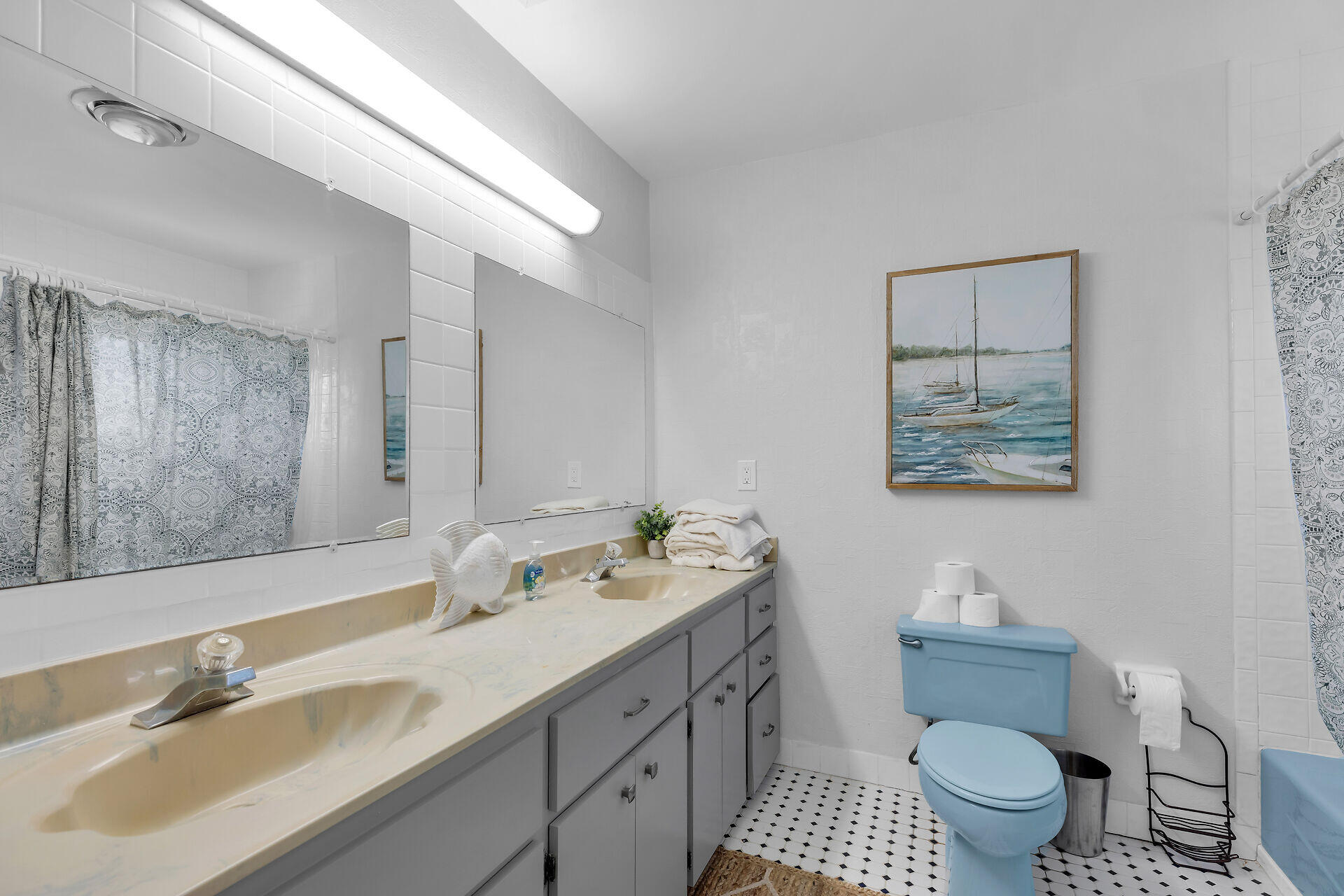 1519 Johnson Street Key West, FL 33040 - Photo 33 of 47 a bathroom with a double vanity sink mirror and toilet