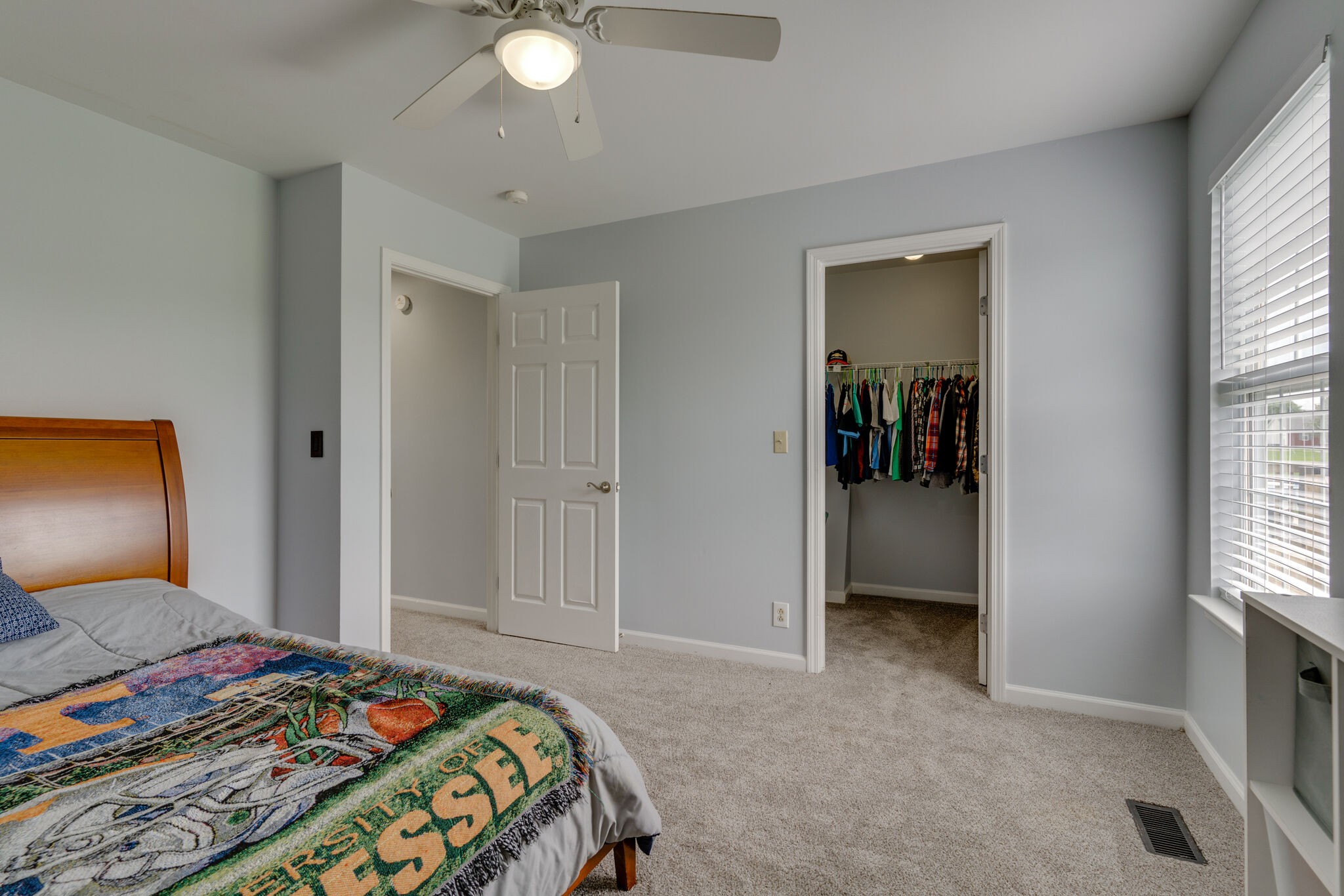 5259 East Robertson Road Cross Plains, TN 37049 - Photo 18 of 28 a bedroom with a bed and a potted plant