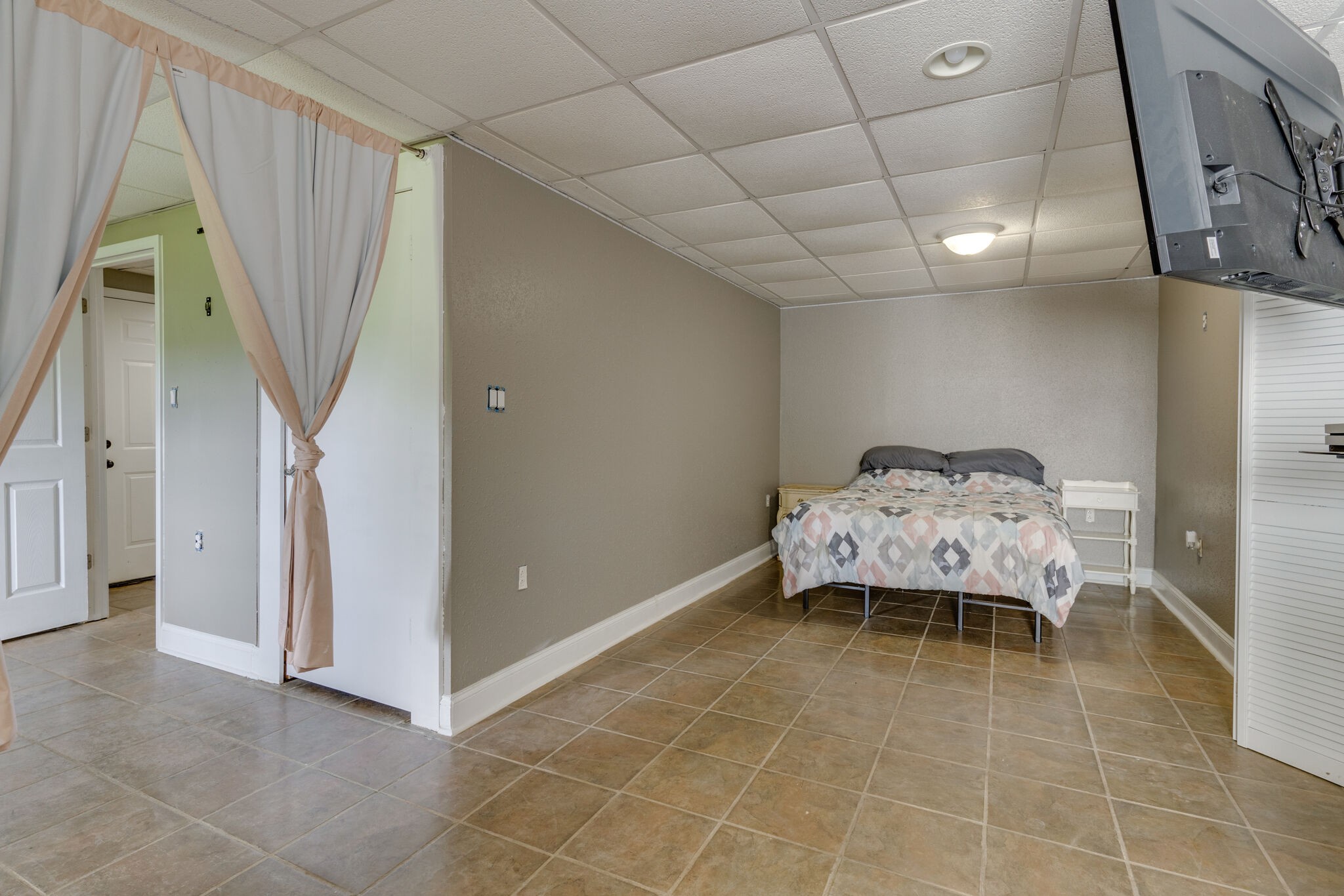 5259 East Robertson Road Cross Plains, TN 37049 - Photo 22 of 28 a bedroom with a bed and a window