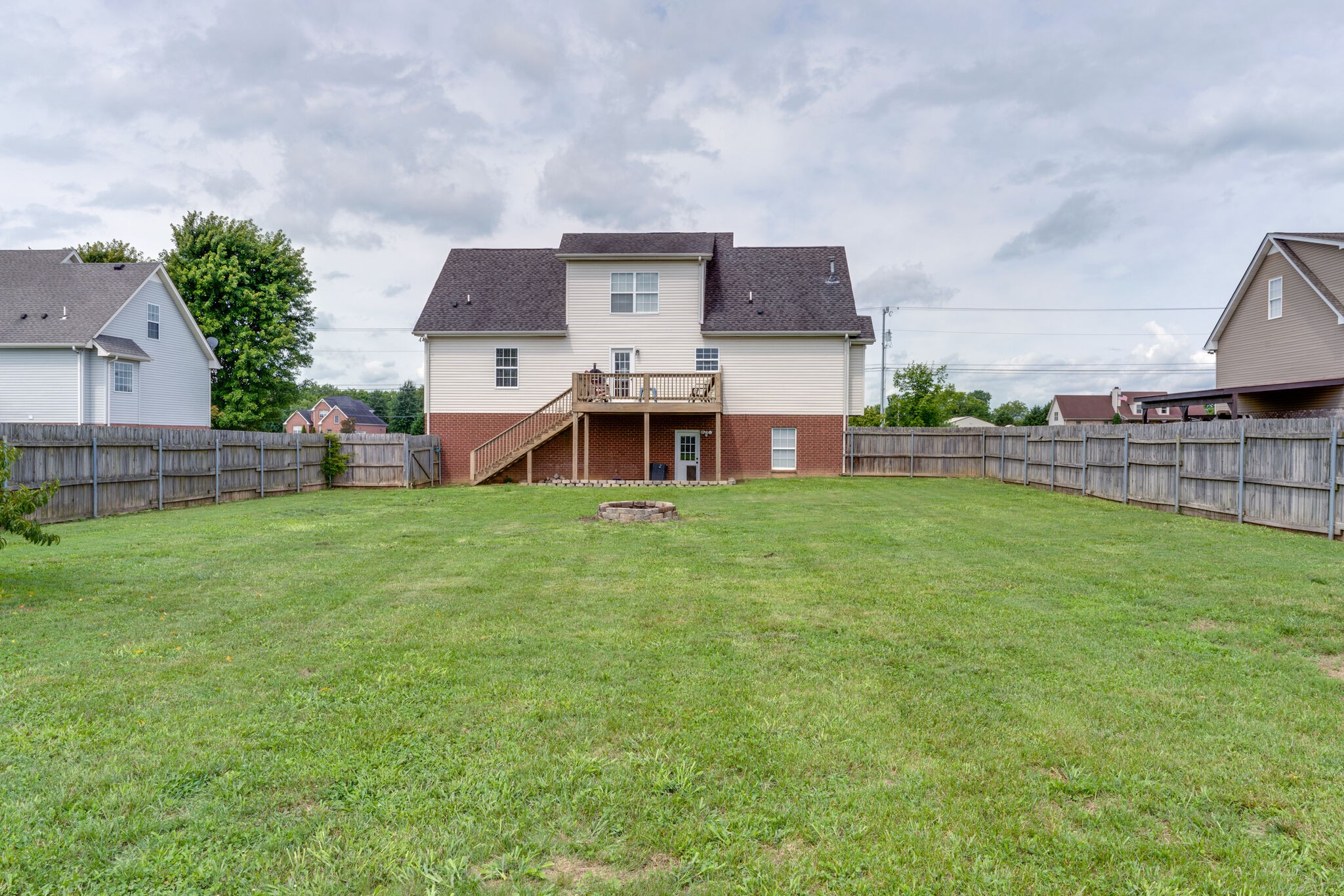 5259 East Robertson Road Cross Plains, TN 37049 - Photo 28 of 28 a front view of a house with a garden and yard