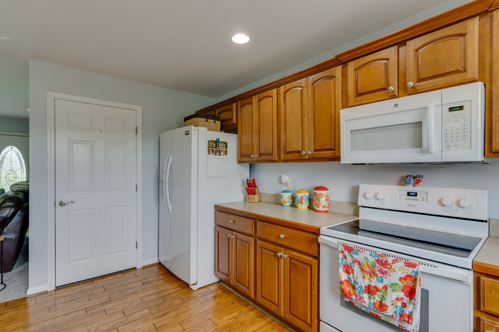 5259 East Robertson Road Cross Plains, TN 37049 - Photo 9 of 28 a kitchen with stainless steel appliances granite countertop a sink dishwasher stove and cabinets with wooden floor