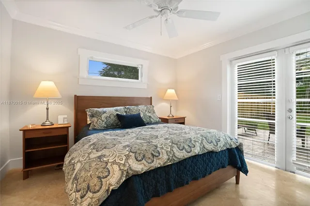 a bedroom with a bed and a lamp on table