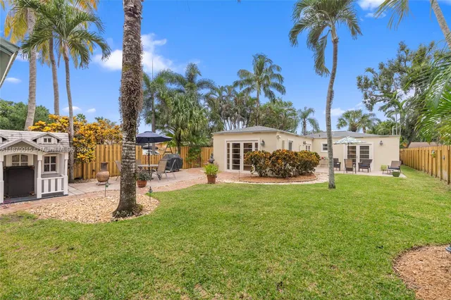 a house view with a garden space