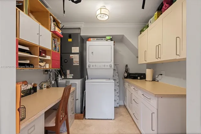 a kitchen with a sink a stove and a refrigerator