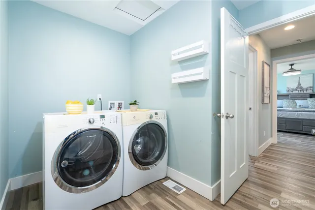 a utility room with dryer and washer
