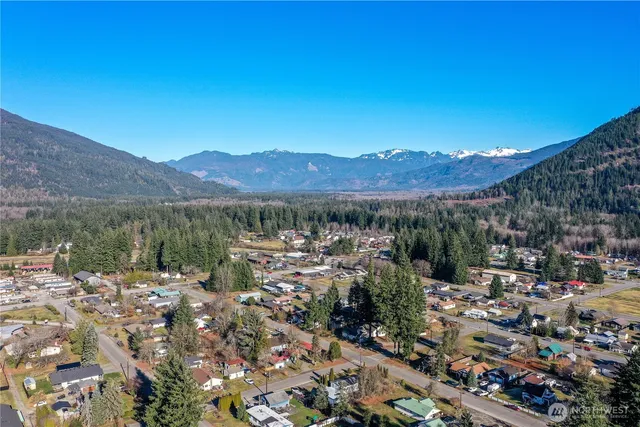 a view of a city with mountains in the background