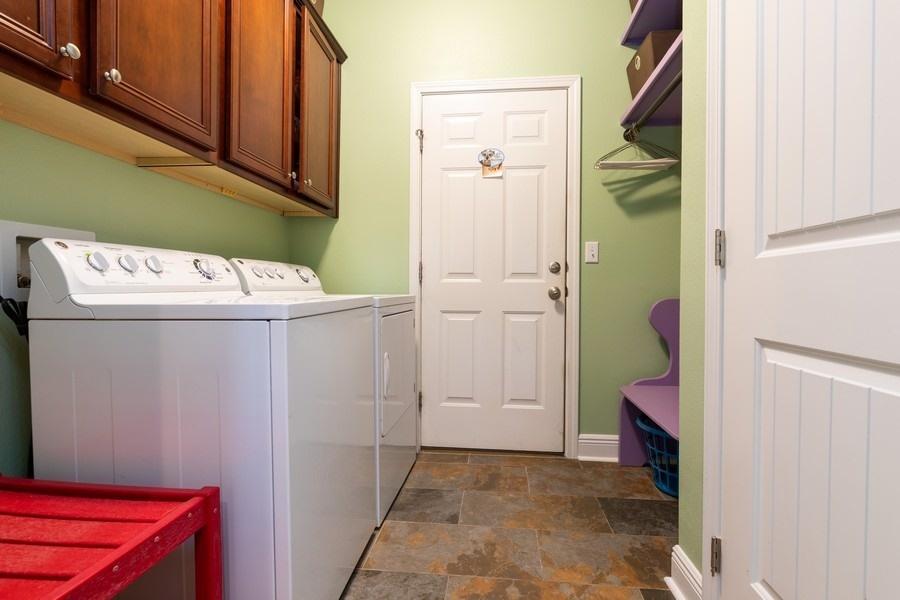 387 Pin Oak Loop Santa Rosa Beach, FL 32459 - Photo 24 of 36 a utility room with dryer and washer