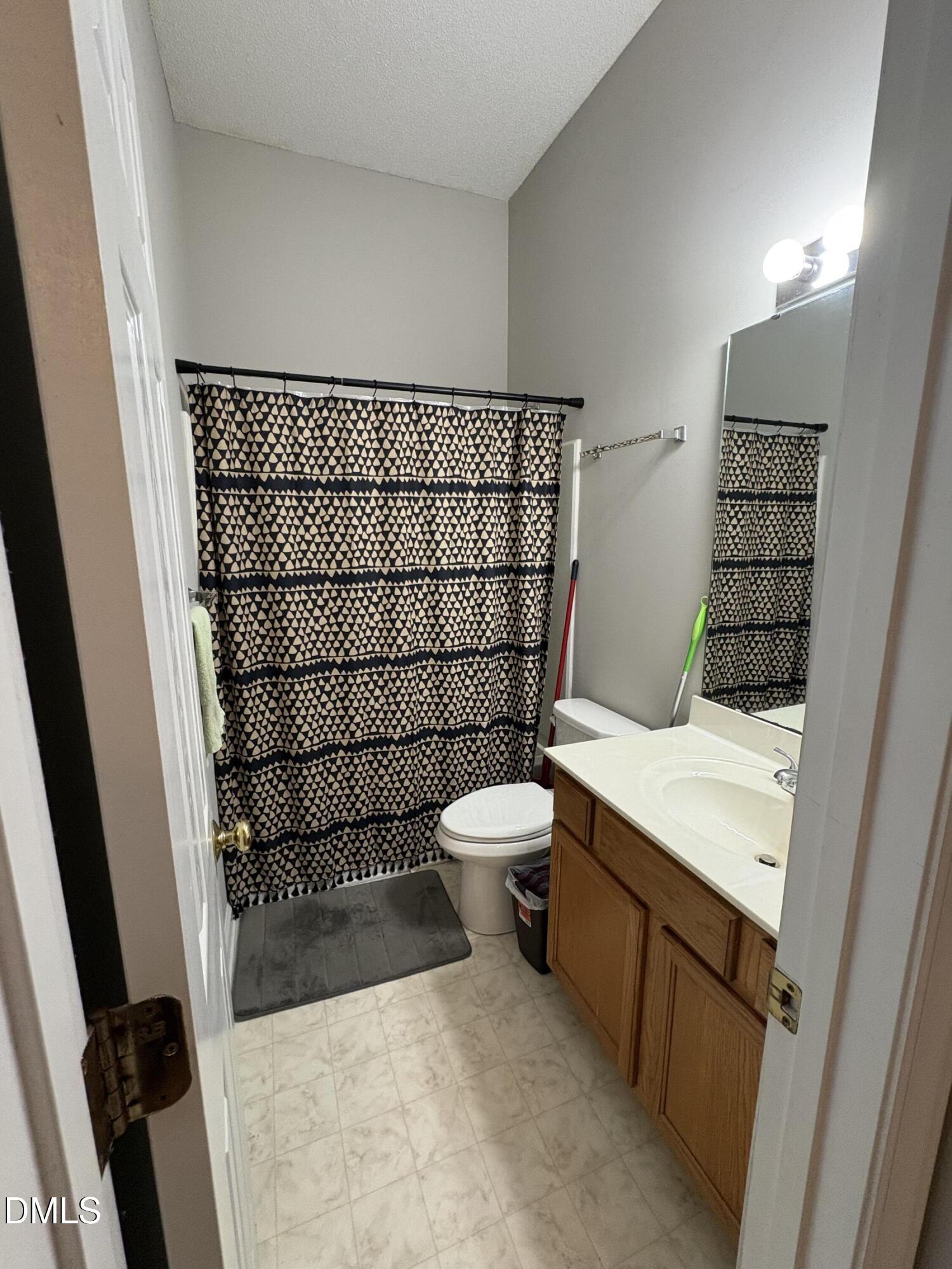 7342 Doverton Court Raleigh, NC 27615 - Photo 15 of 17 Hall Bath