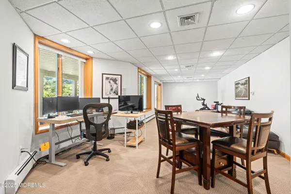 a view of entryway with wooden floor and stairs