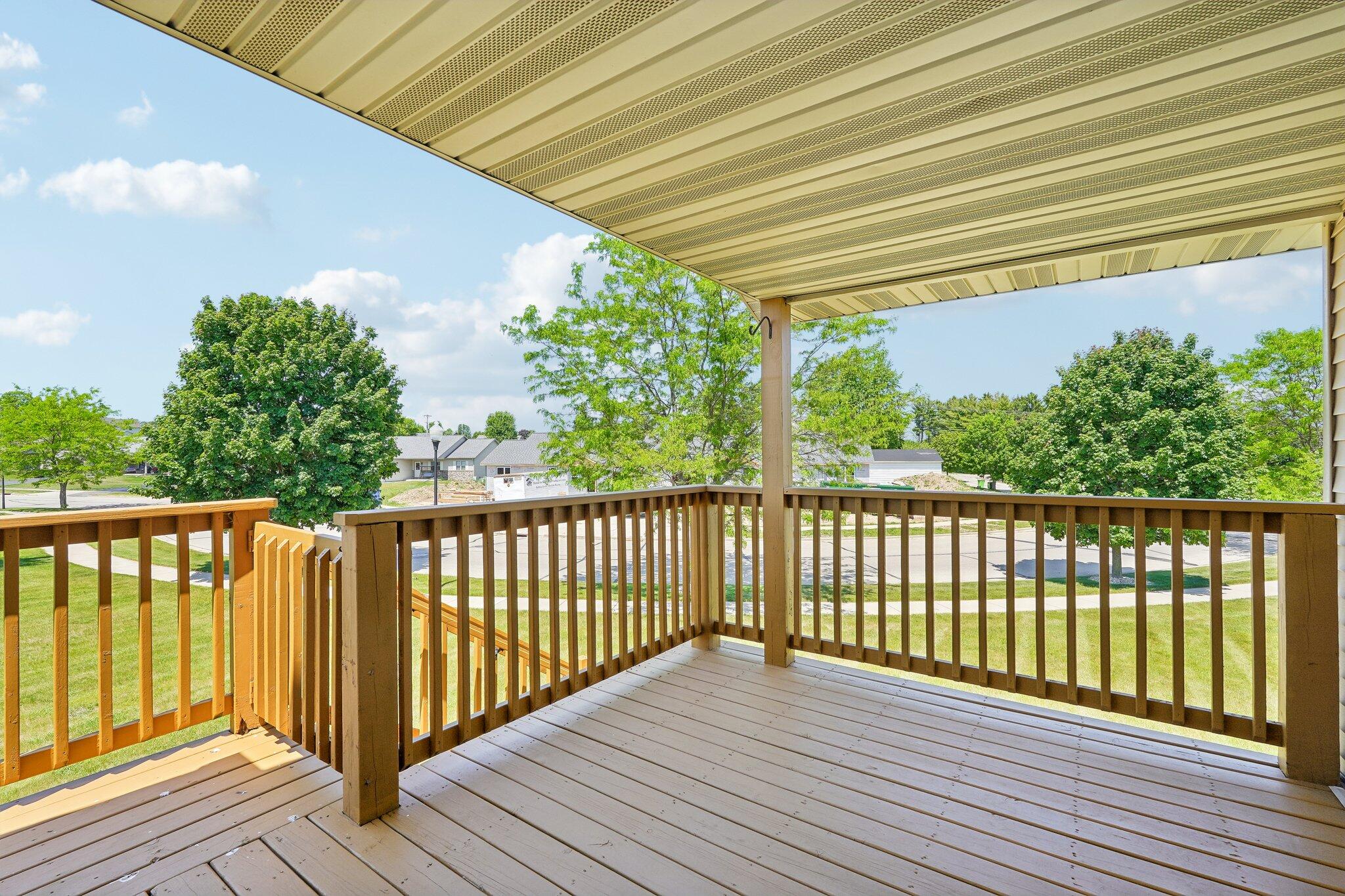865 Prairie Gardens, Unit 91 Kewaskum, WI 53040 - Photo 32 of 39 Covered Deck