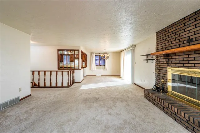 a view of a livingroom with a staircase