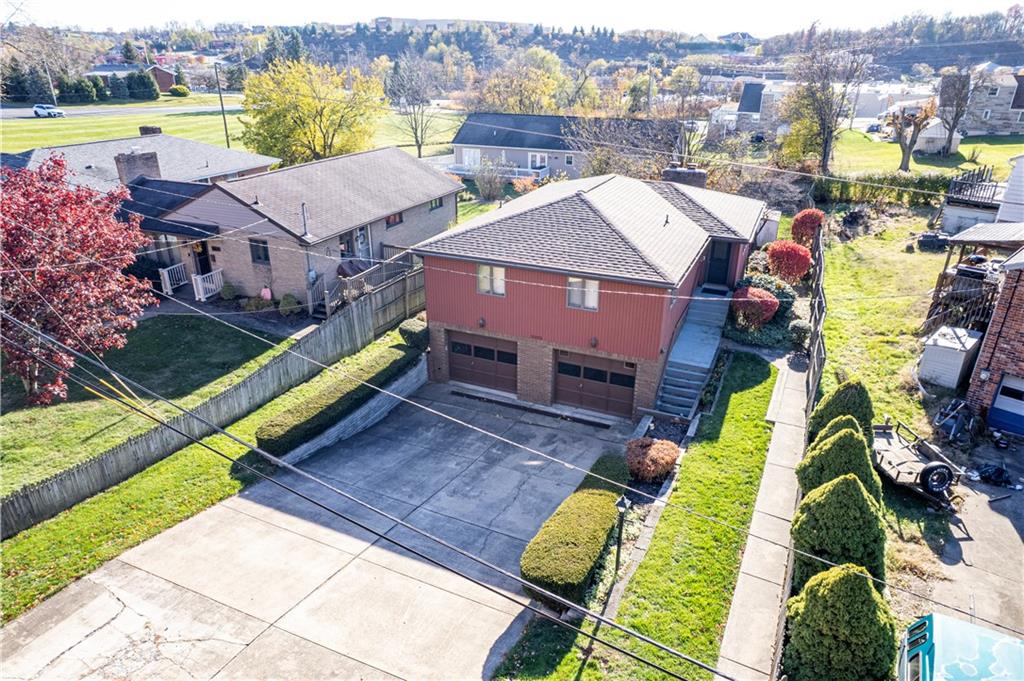 2002 Michael Avenue Irwin, PA 15642 - Photo 37 of 49 an aerial view of a house with a swimming pool yard and lake view